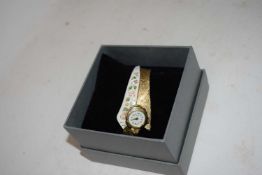MODERN LADIES WATCH ON ENAMELLED EXPANDABLE STRAP