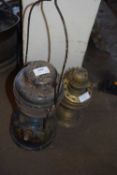 PARAFFIN LAMP AND AN OIL LAMP