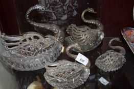 GROUP OF FOUR CUT GLASS AND WHITE METAL MOUNTED MODEL SWANS, THE WINGS STAMPED 925, VARIOUS SIZES,