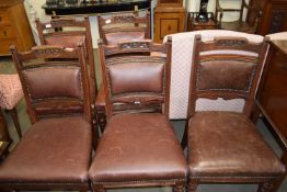 FIVE LATE VICTORIAN LEATHER UPHOLSTERED DINING CHAIRS