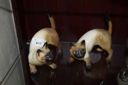 TWO POTTERY SIAMESE CATS