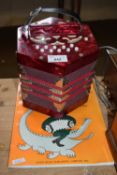 RED LACQUER FINISH CONCERTINA AND INSTRUCTION BOOK