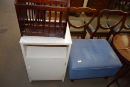 WHITE BEDSIDE CABINET, A MAGAZINE RACK AND A BLUE UPHOLSTERED FOOT STOOL, AND A LIGHT WOOD EFFECT