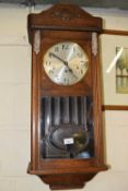 EARLY 20TH CENTURY OAK CASED WALL CLOCK