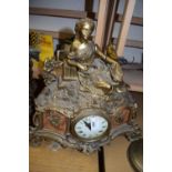 FRENCH BRASS CASED MANTEL CLOCK WITH FIGURAL MOUNTS