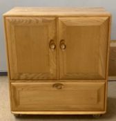 Ercol light elm TV and audio cabinet, 84cm wide