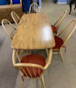 Ercol light elm dining table with extra extension section together with a set of six hoop and