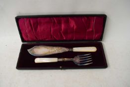 CASED SET OF SILVER PLATED AND MOTHER OF PEARL HANDLED FISH SERVERS