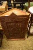 LATE 19TH CENTURY SINGLE DOOR CORNER CUPBOARD WITH CARVED FLORAL DETAIL