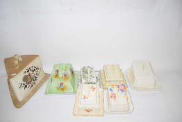 SEVEN VARIOUS WEDGE FORMED CHEESE AND BUTTER DISHES