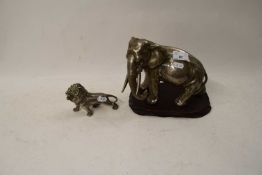 BASE METAL OR PLATED MODEL ELEPHANT AND A FURTHER MODEL LION (2)