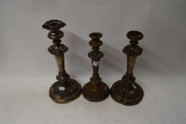 THREE SILVER PLATE ON COPPER CANDLESTICKS