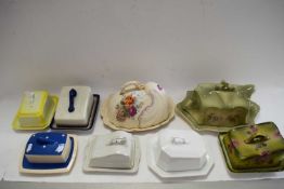 EIGHT MIXED CHEESE AND BUTTER DISHES TO INCLUDE A SHELL FORMED EXAMPLE
