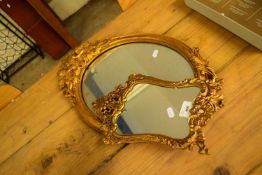 OVAL WALL MIRROR IN GILT EFFECT FRAME TOGETHER WITH A FURTHER SMALL WALL MIRROR IN A METAL FRAME (