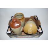 TWO STONEWARE HOT WATER BOTTLES AND A STONEWARE JAR