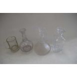 FOUR DECANTERS AND TANKARDS