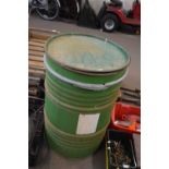 GREEN PAINTED METAL OIL DRUM