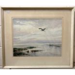 Roland J. Green (British, 20th century) A lone Heron in flight, watercolour, signed and dated (