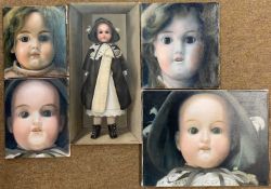 Edna Bizon (British, early 20th century) Four doll portraits, plus a doll (full length) in a box