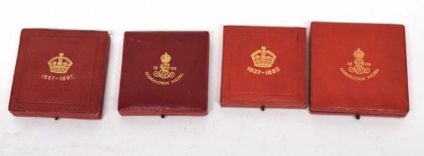 Four cased medallions to include one to commemorate the Diamond Jubilee of Queen Victoria, a smaller