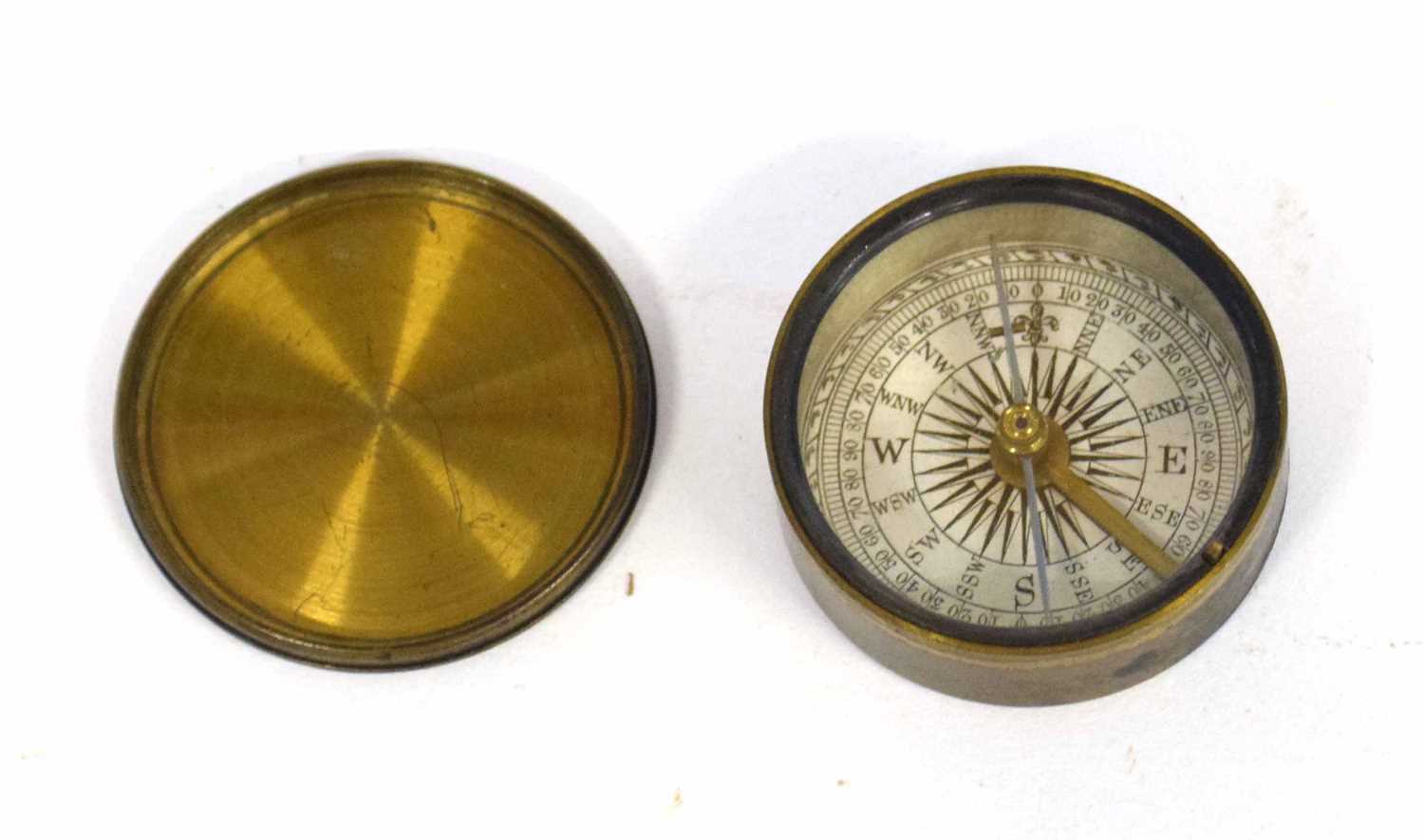 Small brass Victorian travelling compass with brass topped lid