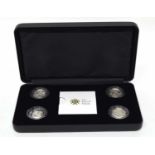 Cased 2008 and 2011 silver four coin proof set