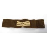 20th century British Army Sgt insignia armband upon battledress serge material (lacking buttons)