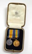 Pair of WWI medal miniatures to include 1914-19 War medal and 1914-19 Victory medal in case