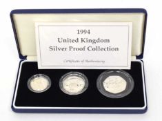 Cased 1994 silver three coin proof set
