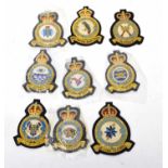 Collection of nine 20th century RAF Squadron blazer and uniform badges to include a Pathfinder