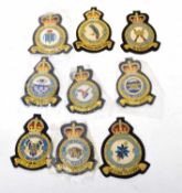 Collection of nine 20th century RAF Squadron blazer and uniform badges to include a Pathfinder