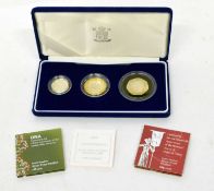 Cased 2003 silver three coin double helix proof set