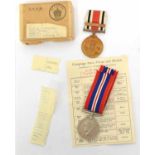 1939-45 War medal and paperwork with OHMS WWII cardboard box, together with a George V Special