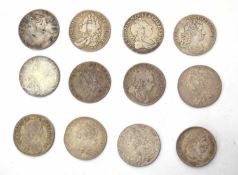 Quantity of silver coins to include 11 George II shillings, four George I shillings and three