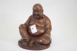 Carved wooden figure of a Buddha