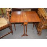 Late 19th century American walnut Sutherland style drop leaf dining table raised on turned legs,