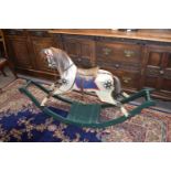 19th century and later small rocking horse with dappled grey painted body, raised on green painted