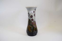 Large modern Moorcroft vase with tube lined design of leaves and fruit, 30cm high