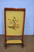 19th century rosewood framed needlework screen set on swept feet, 84cm wide