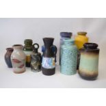 Group of West German pottery vases and jugs, all with typical lava like designs, tallest vase 26cm