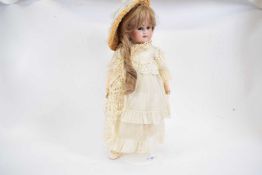 Late 19th century doll with bisque head