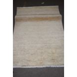 Contemporary beige floor rug 145 x 100cm