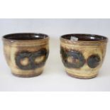Pair of West German pottery jardinieres with brown glazed decoration in relief, 21cm diam (2)