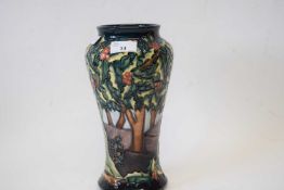 A Moorcroft vase with tube lined decoration in the Holly Watch pattern28cmGood condition