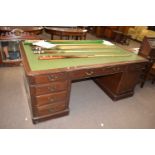 20th century hardwood partners desk, the rectangular top with leatherette inset writing surface over