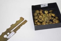 Box containing quantity of military brass buttons, Royal Artillery etc and small measuring gauge