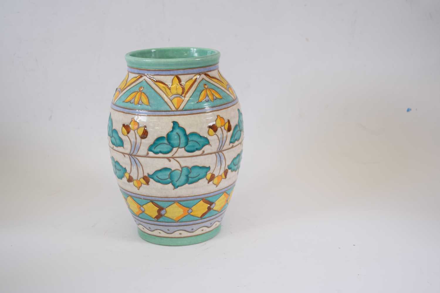 An Art Deco Bursley ware vase with a design by Charlotte Rhead artist's signature to base20cmGood