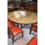 18th century oak drop leaf dining table on bobbin turned legs, 169cm wide when open