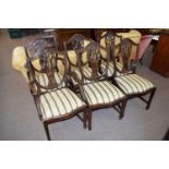 Set of six reproduction shield back dining chairs with striped upholstered seats