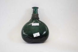 A late 18th/19th century Persian green glass saddle flask of compressed ovoid form with tapered neck